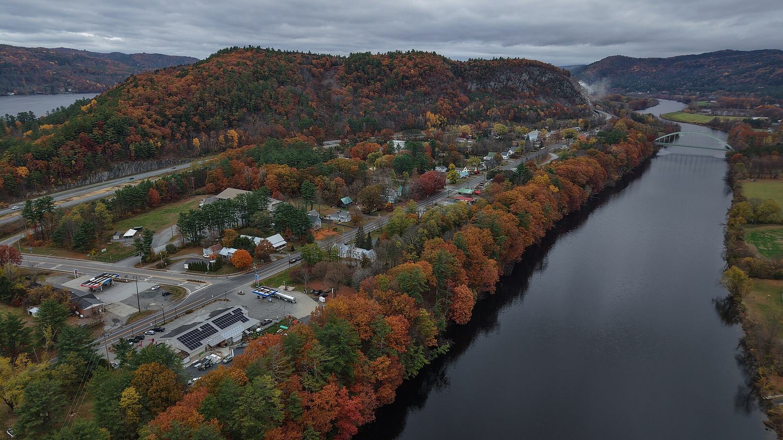The Connecticut River at Fairlee, with the banks lined in orange and red.